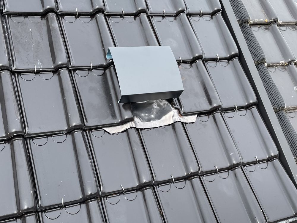 Detail: verluchting met loodslabbe
